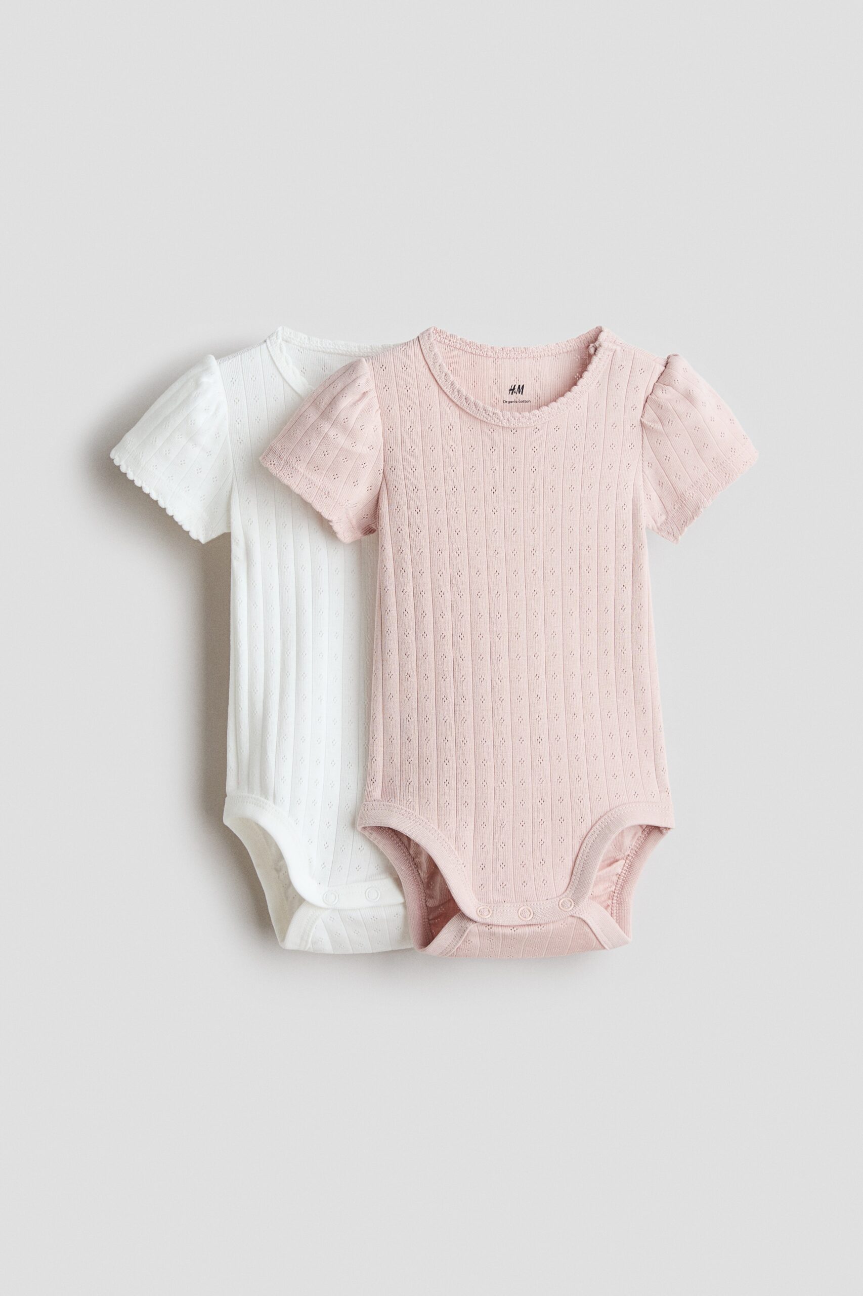 H & M - Set van 2 katoenen rompers met pointelledessin - Lichtroze/Wit