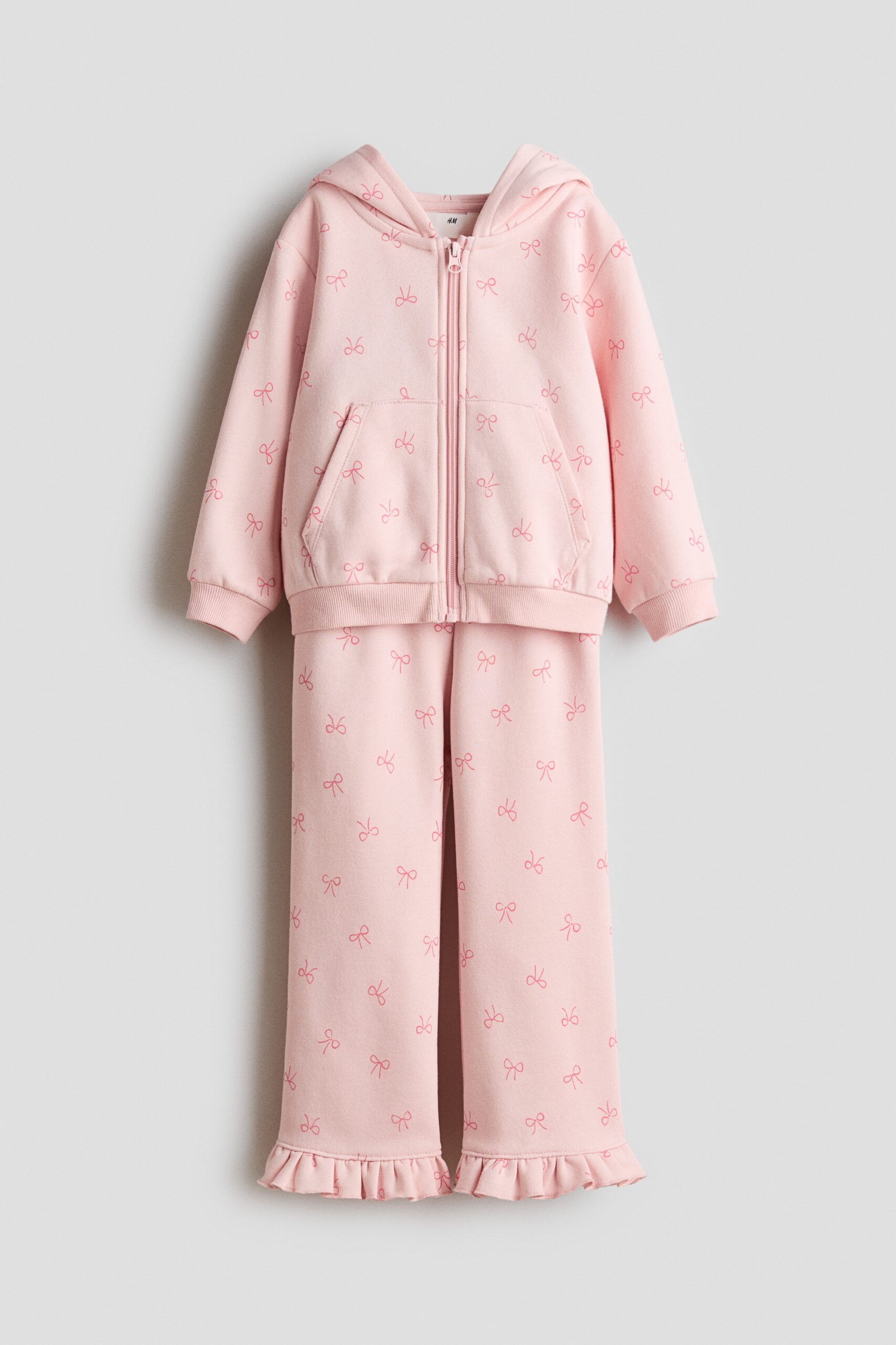 H & M - Tweedelige set van joggingstof met print - Lichtroze/Strikjes