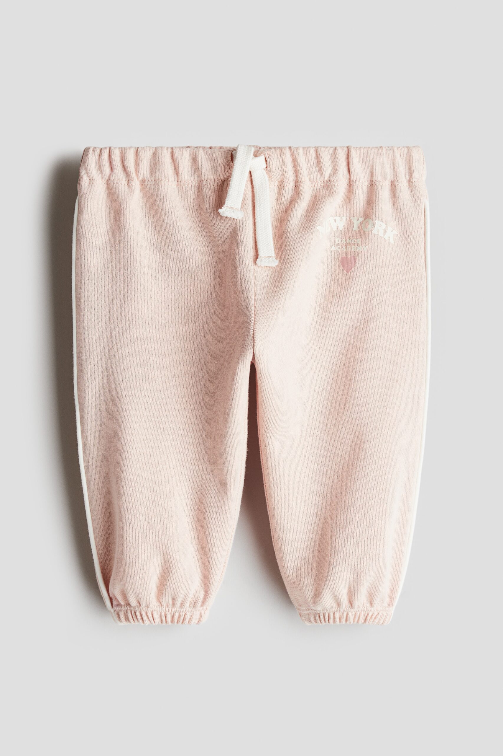 H & M - Joggers van joggingstof - Lichtroze/New York