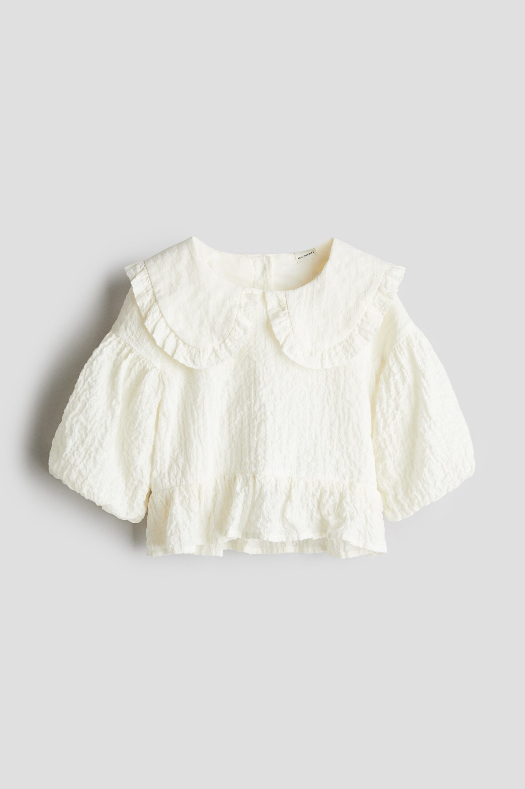 H & M - Blouse van seersucker met pofmouwen - Roomwit