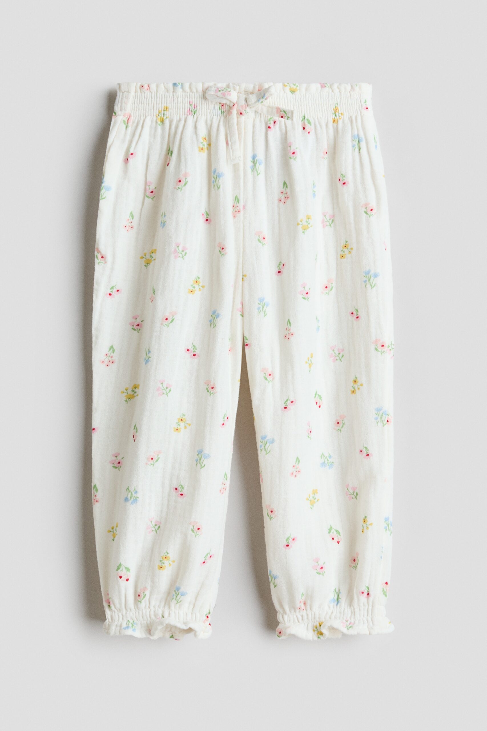 H & M - Broek van katoenen mousseline - Roomwit/Bloemen
