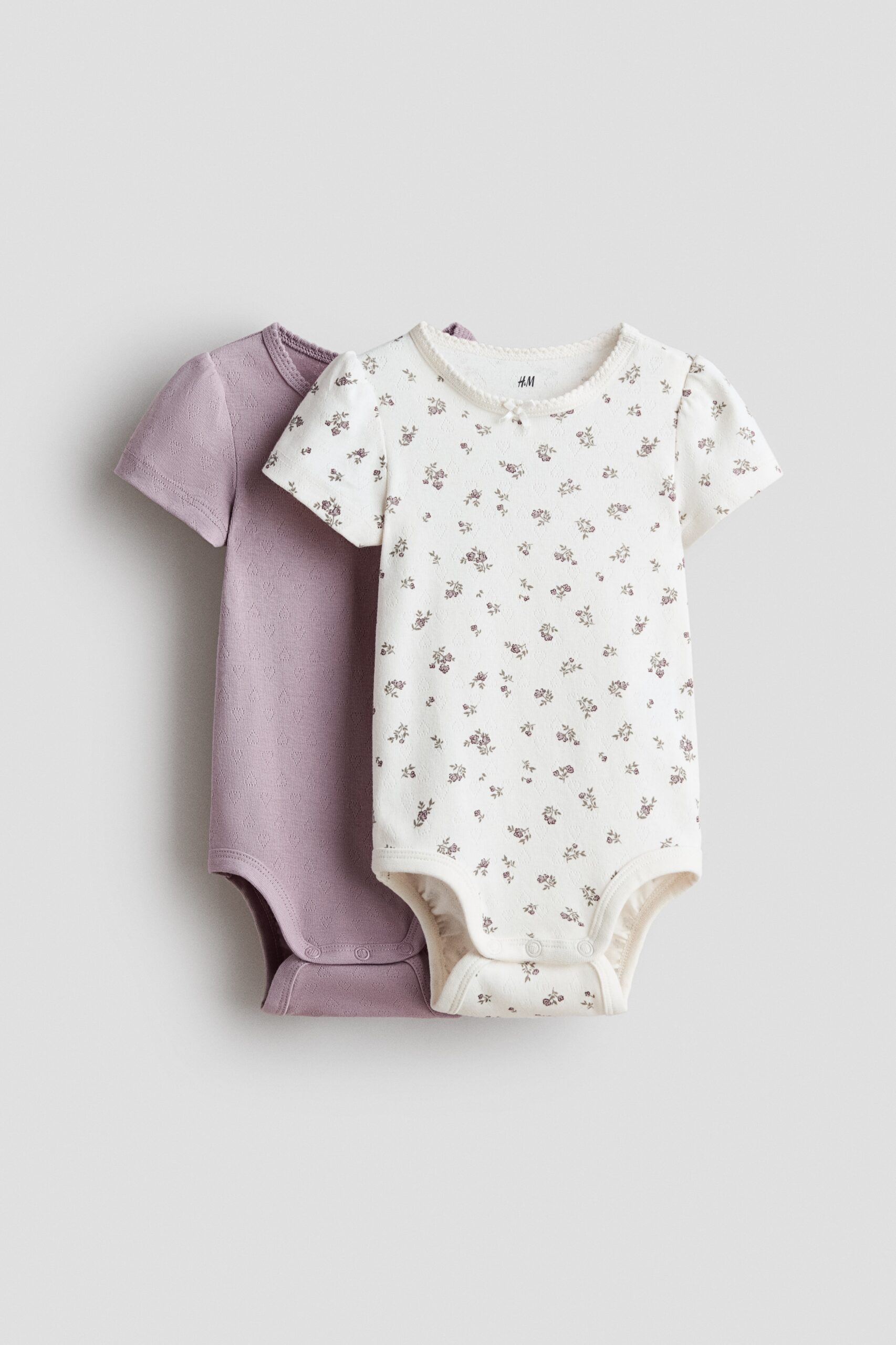 H & M - Set van 2 katoenen rompers met pointelledessin - Dusty Paars/Bloemen