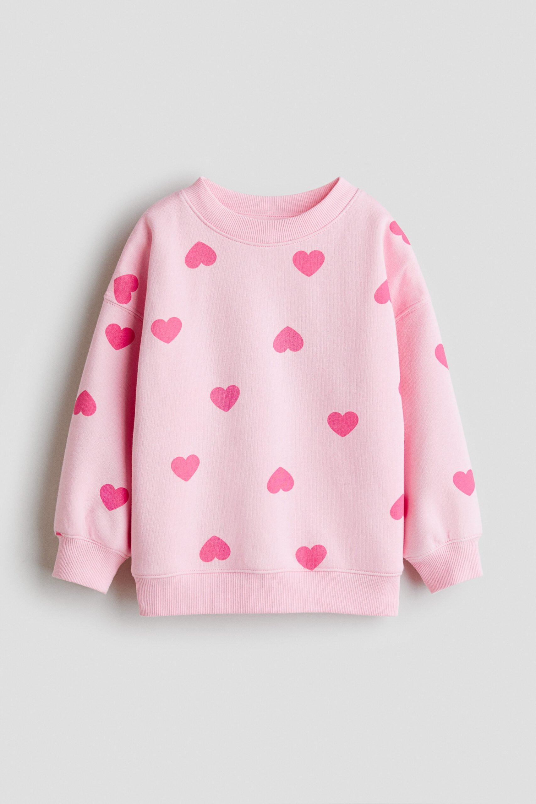 H & M - Oversized sweater met geruwde binnenkant - Roze/Hartjes