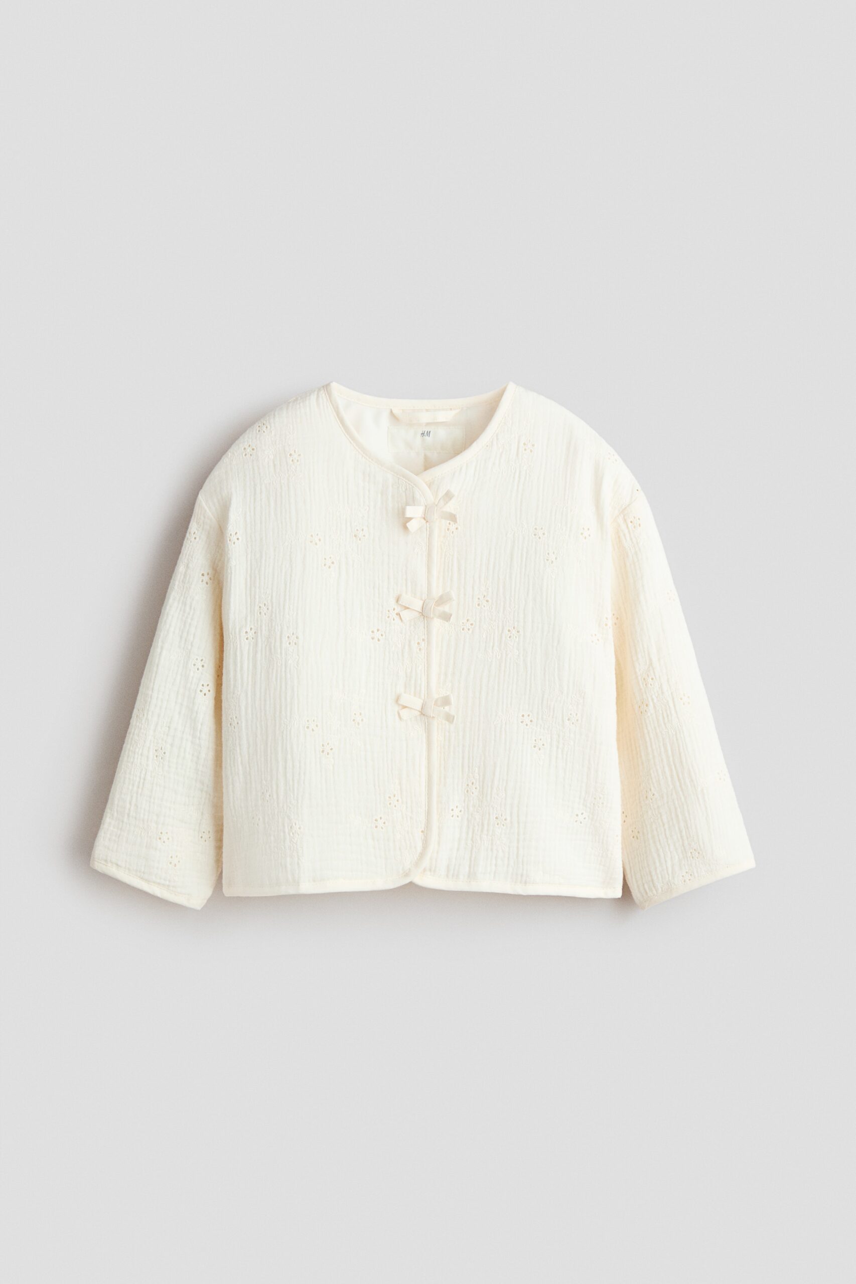 H & M - Mousseline jasje met strikjes - Roomwit
