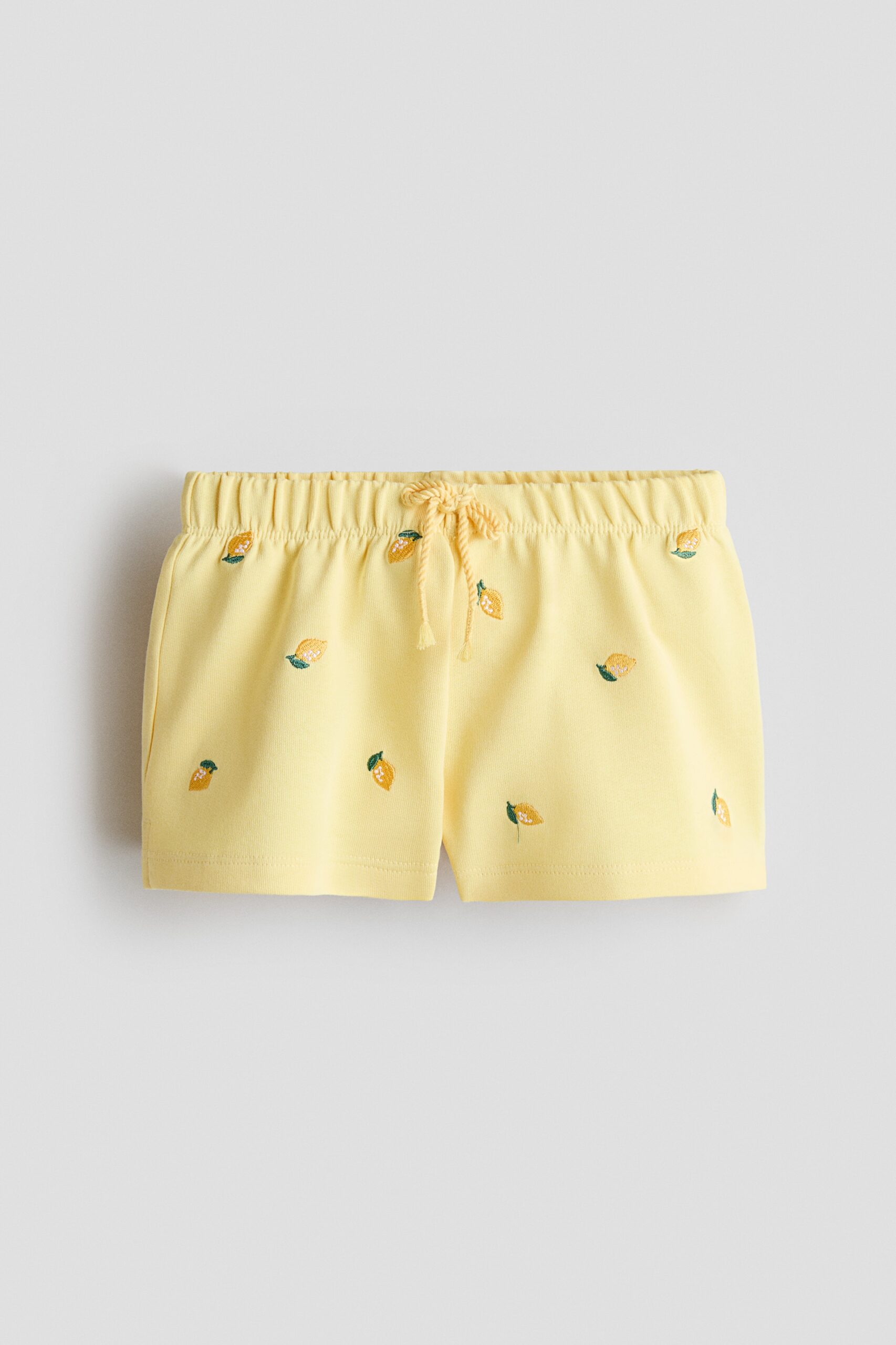 H & M - Joggershort met borduursel - Lichtgeel/Citroenen