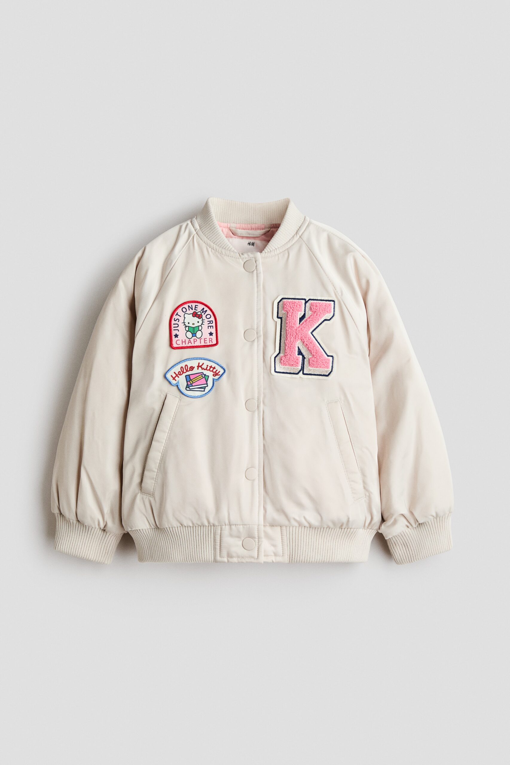 H & M - Gewatteerd baseballjack met applicaties - Lichtbeige/Sanrio