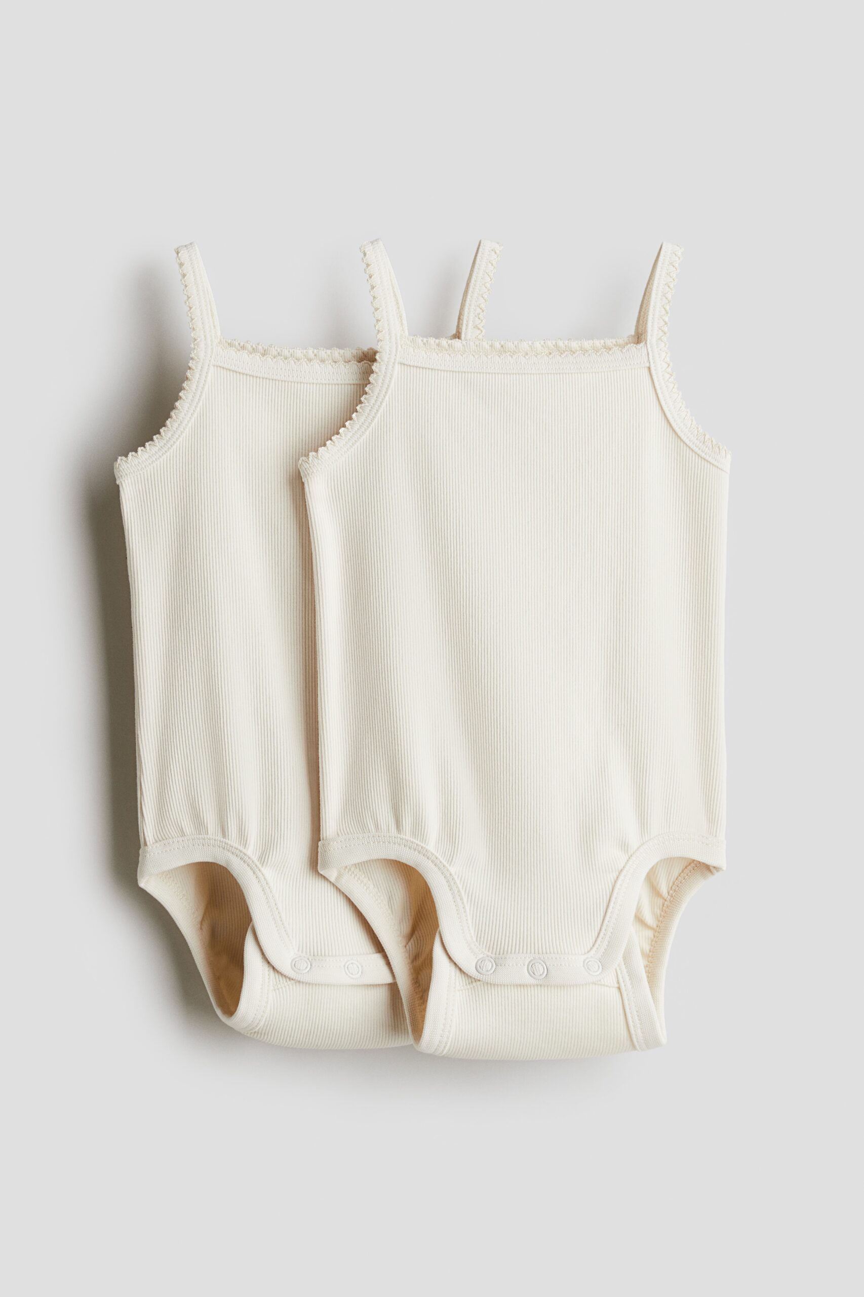 H & M - Set van 2 tricot rompers van pimakatoen - Roomwit