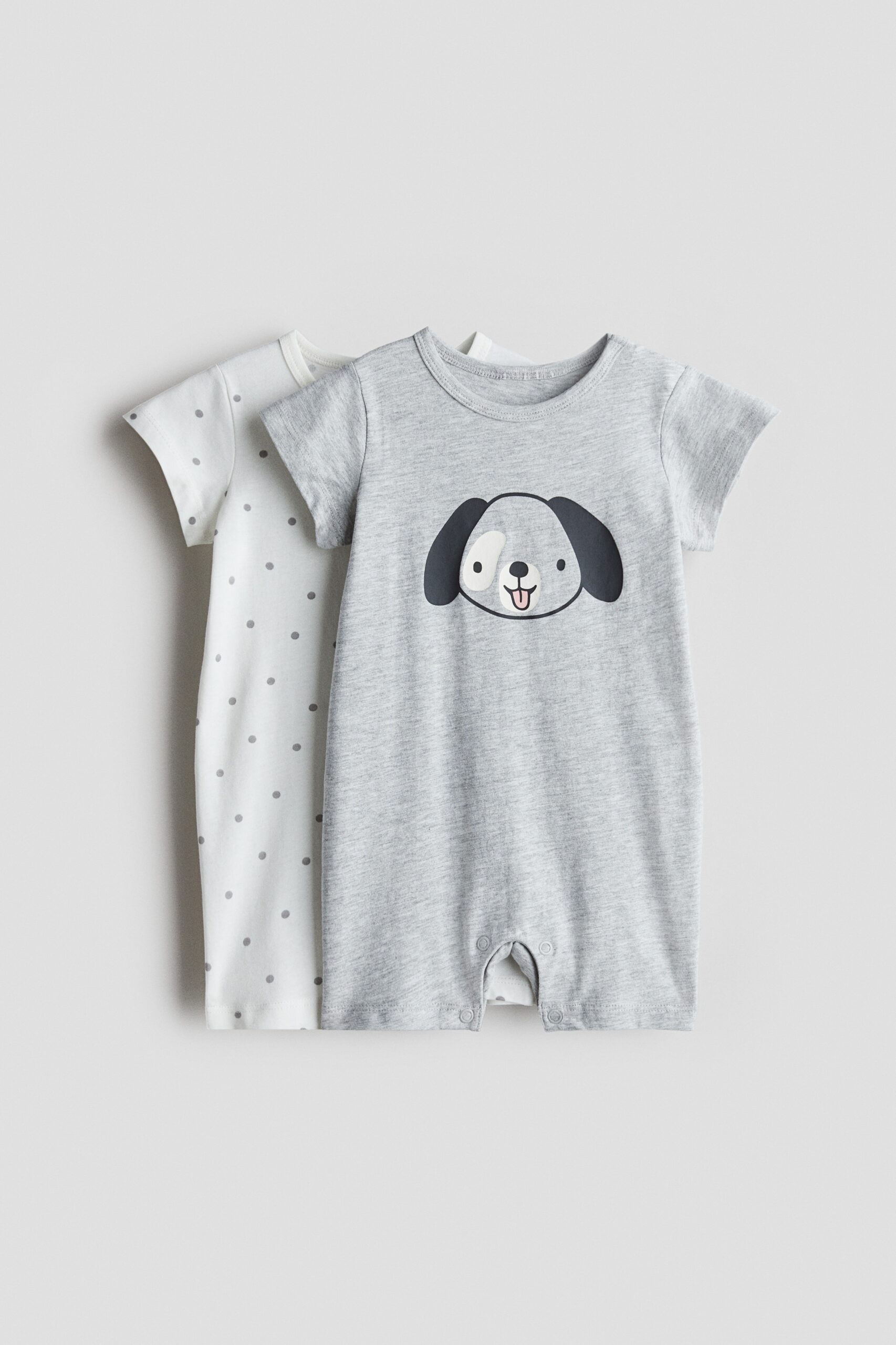 H & M - Set van 2 pyjamapakjes van katoenen tricot - Lichtgrijs/Puppy
