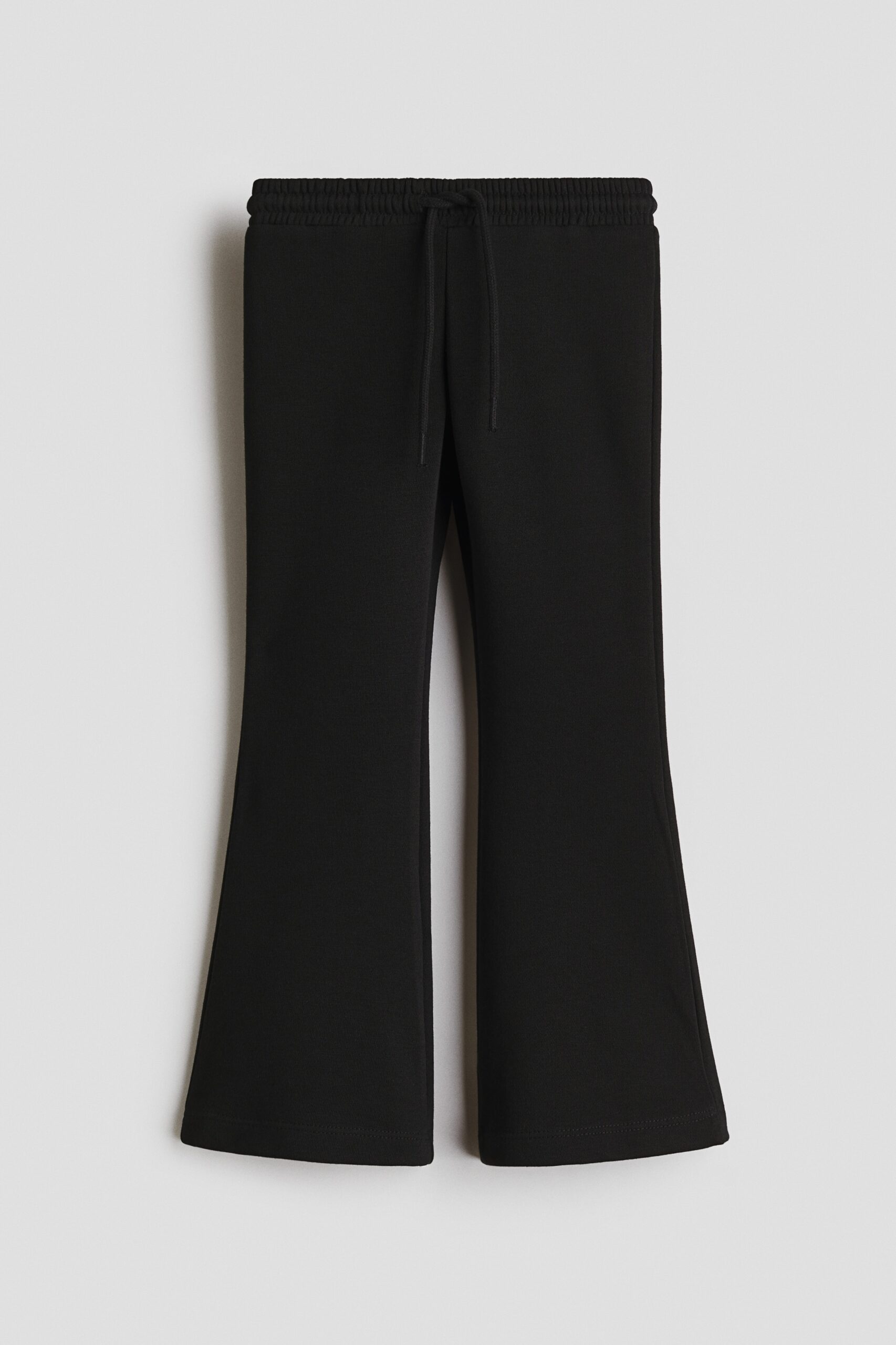 H & M - Uitlopende joggers van katoenmix - Zwart