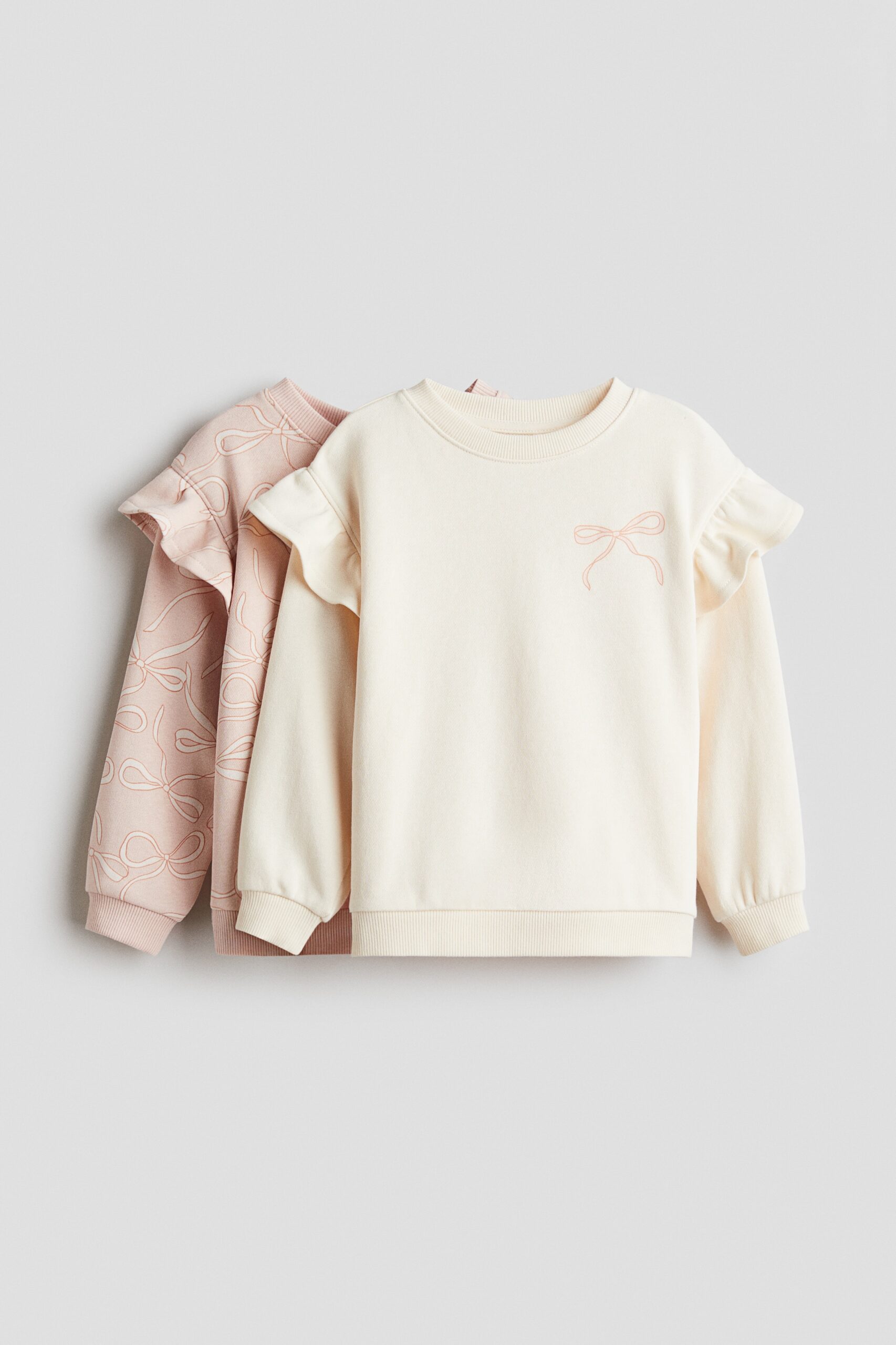 H & M - Set van 2 sweaters met volants - Lichtroze/Strikjes