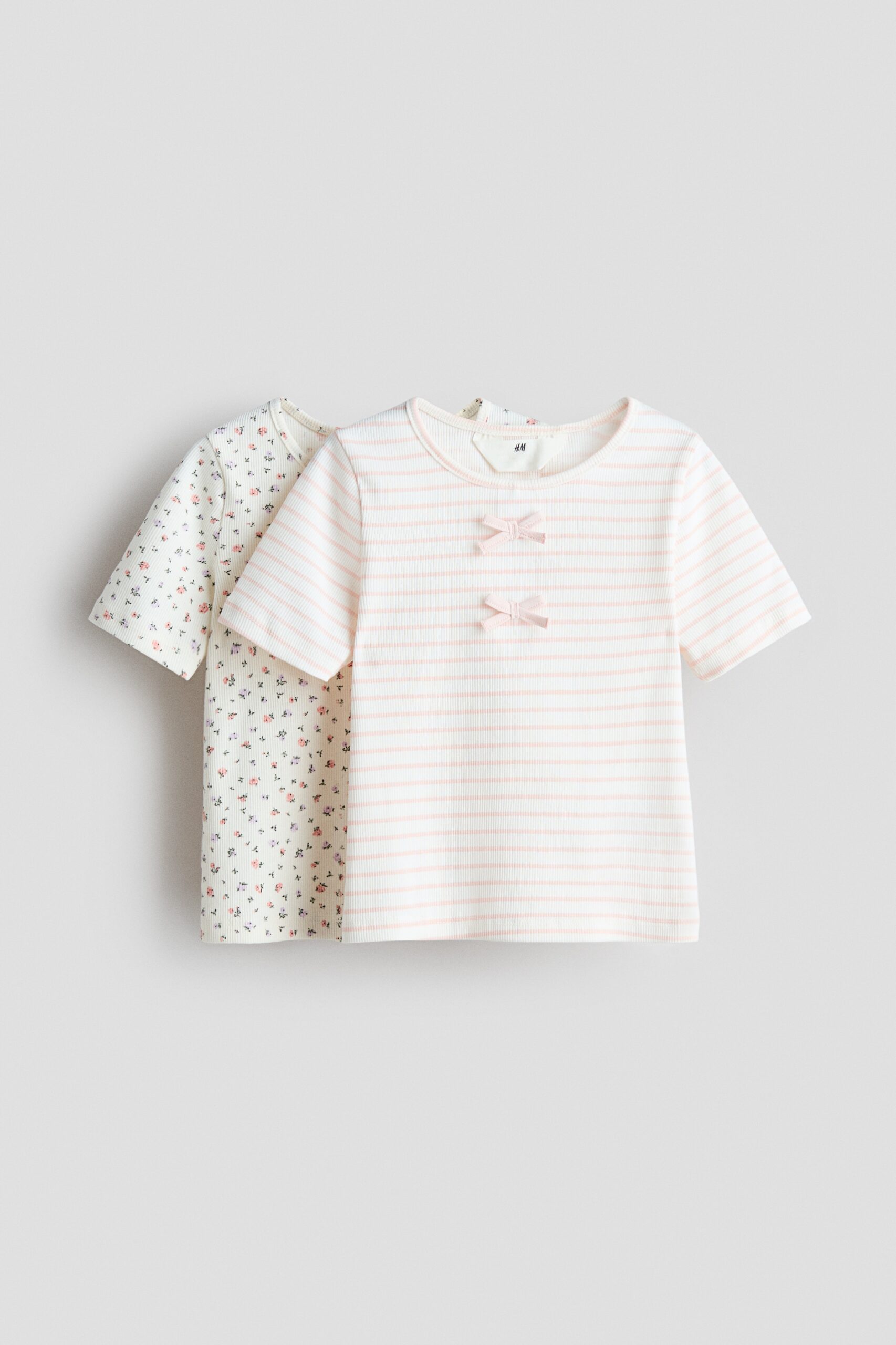 H & M - Set van 2 geribde katoenen tops - Roomwit/Roze Bloemen
